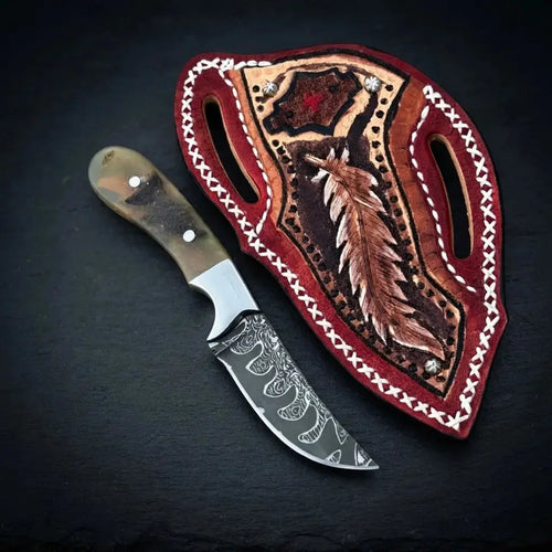 1095 carbon steel cowboy skinner knife with ram horn handle, steel bolster and leather sheath