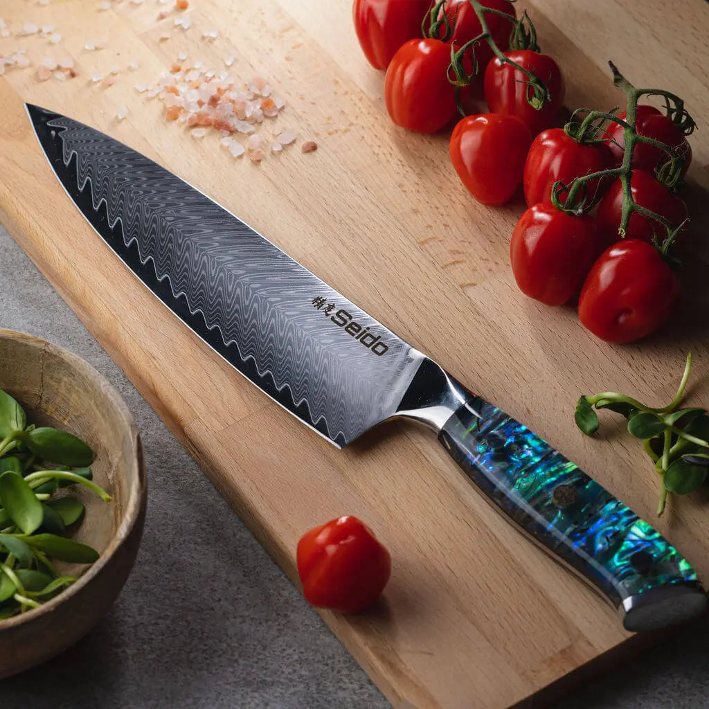 Awabi Japanese Damascus knife with VG-10 core and stainless steel bolster