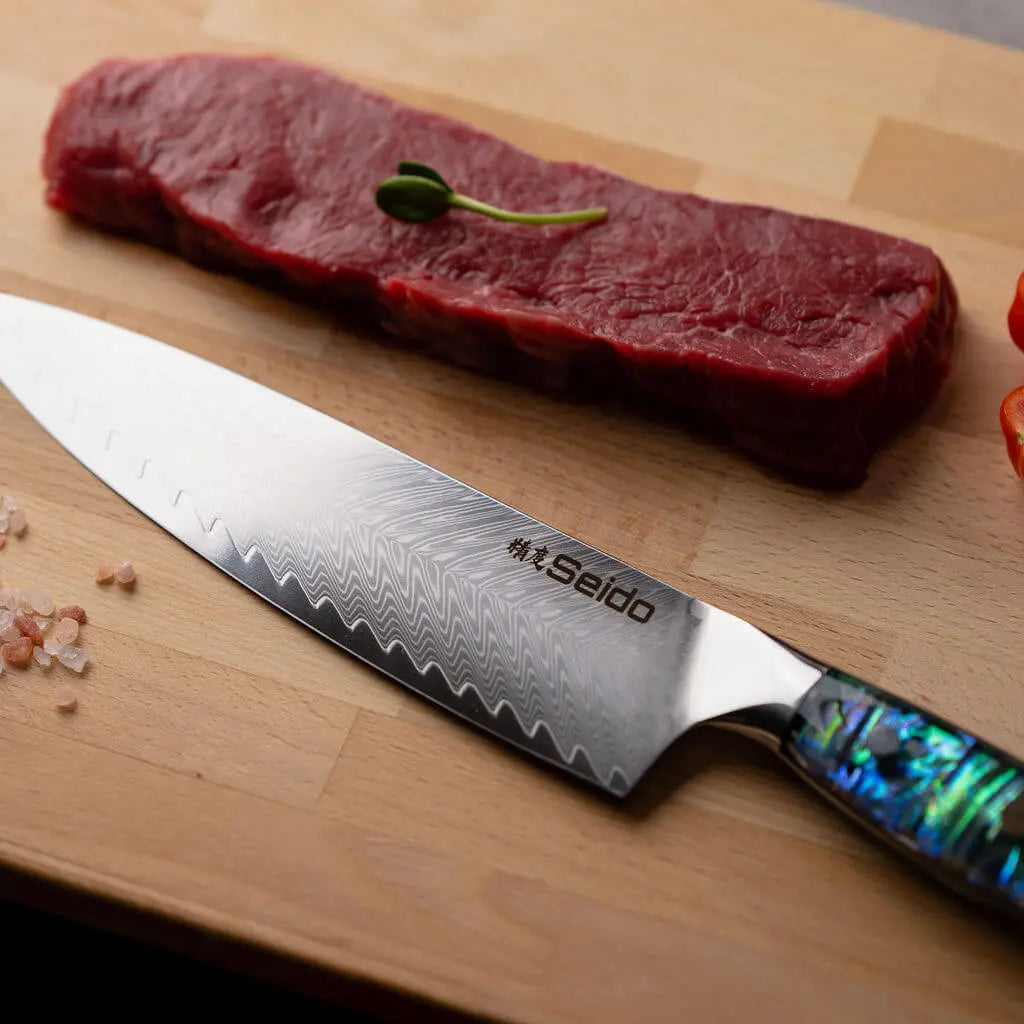 Damascus pattern on an Awabi VG10 kitchen knife blade