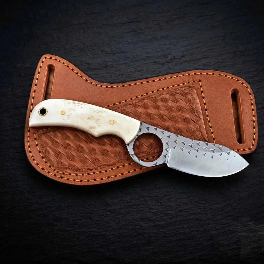 Bonecrest rasp steel skinner knife with bone handle and leather sheath, full view