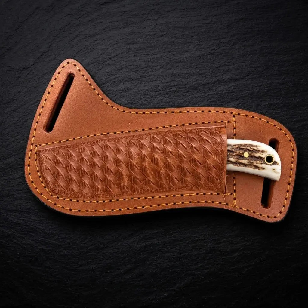 Bonecrest skinner knife with cross-draw leather sheath detail
