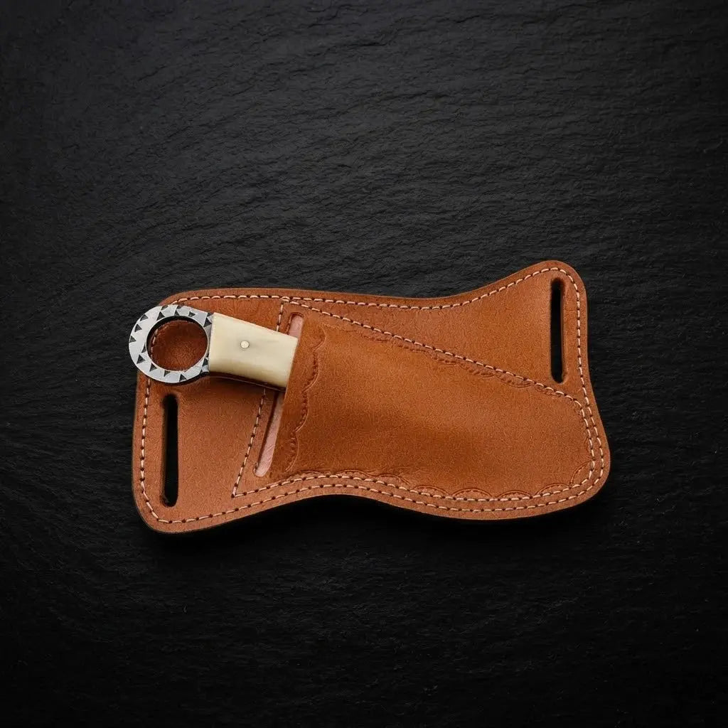 Bonehart skinner knife bone handle and leather sheath detail