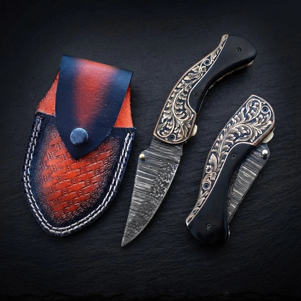 Buffalo horn folding pocket knife with hand-engraved copper bolster