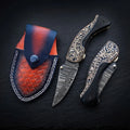 Buffalo horn folding pocket knife with hand-engraved copper bolster