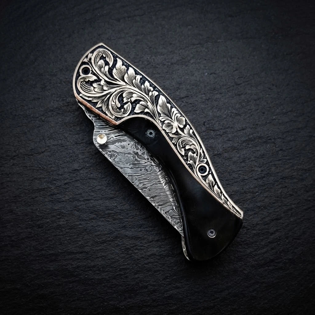 Buffalo horn folding pocket knife — Damascus steel blade close-up