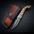 Burnt camel bone folding pocket knife with Damascus bolster