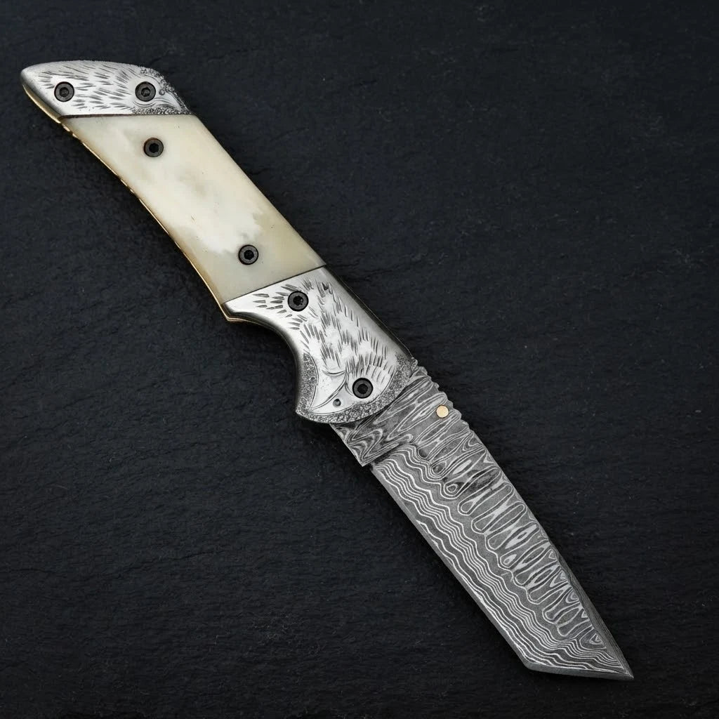 Damascus tanto folding knife — 156-layer blade pattern detail