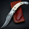 Hand forged Damascus folding knife with camel bone handle