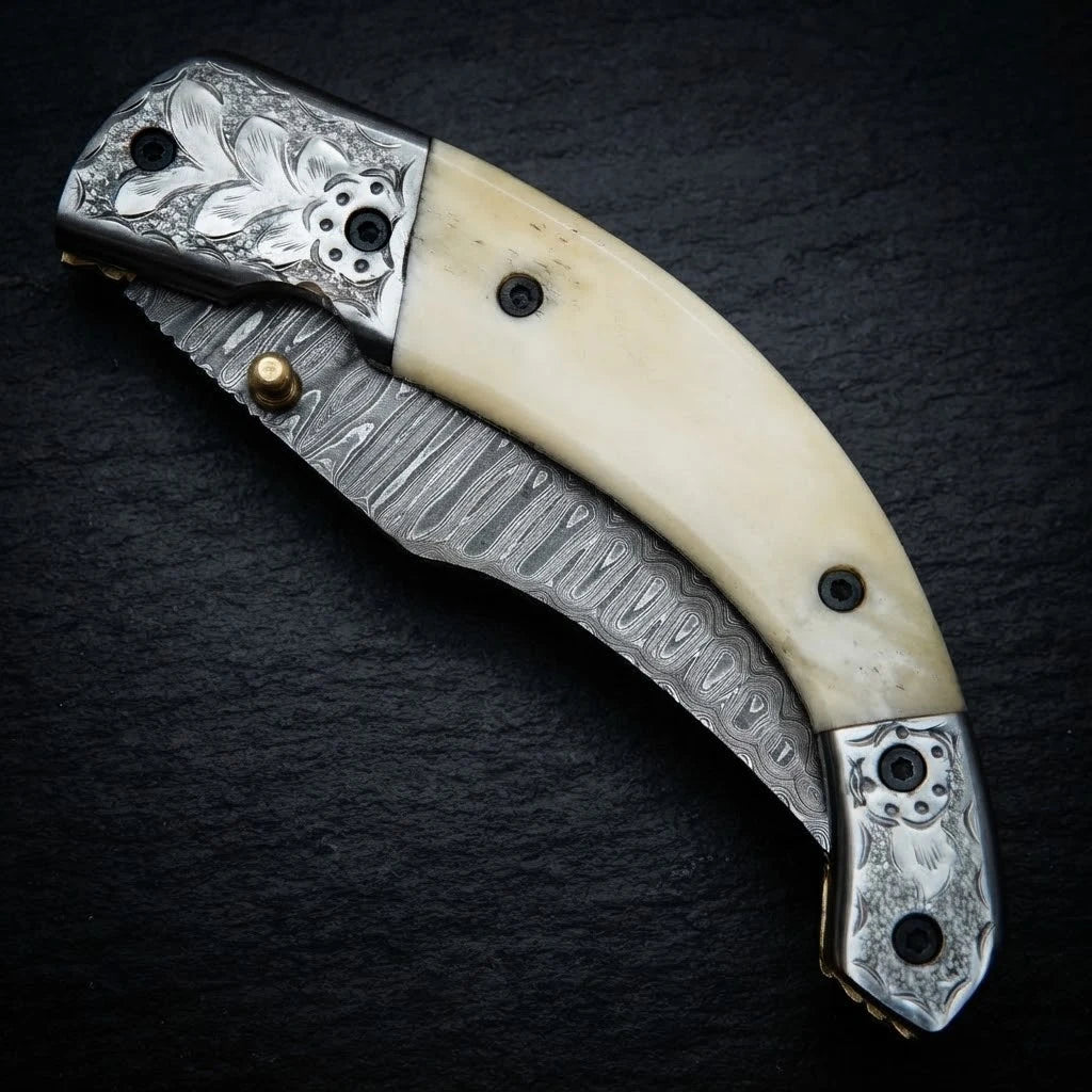 Damascus folding knife folded closed