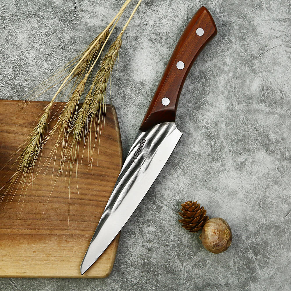 Caveman high-carbon steel butcher knife set with mahogany handles, close-up