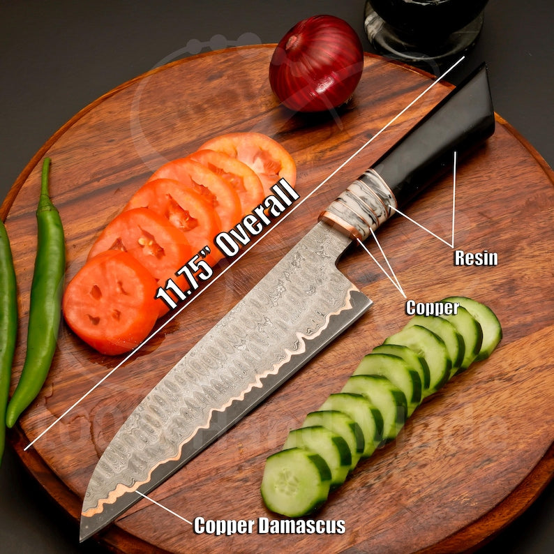 Acid-etched copper wave pattern on a Japanese-style copper Damascus knife