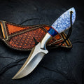 Custom steel hunting knife with a blue and white handle and leather sheath
