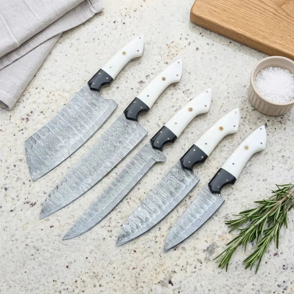 5-piece Damascus chef knife set with white handles: cleaver, santoku, slicing, chef and paring knives