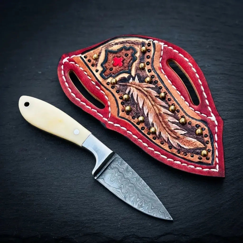 Damascus cowboy knife with bone, buffalo horn and wood handle and Texas flag leather sheath
