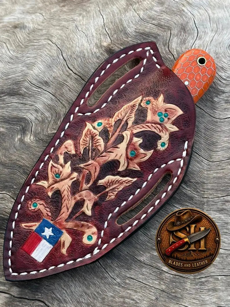 Hand-stitched leather sheath for a compact Damascus cowboy skinner knife