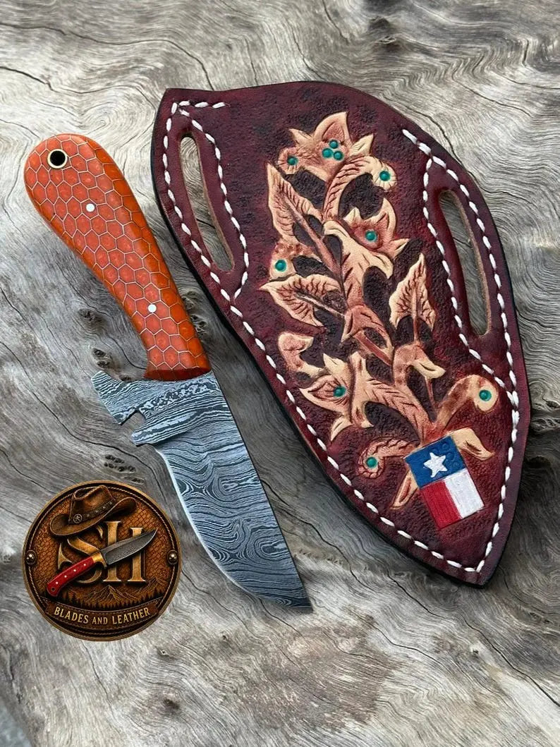 High-carbon Damascus steel skinner blade with resin and steel grip