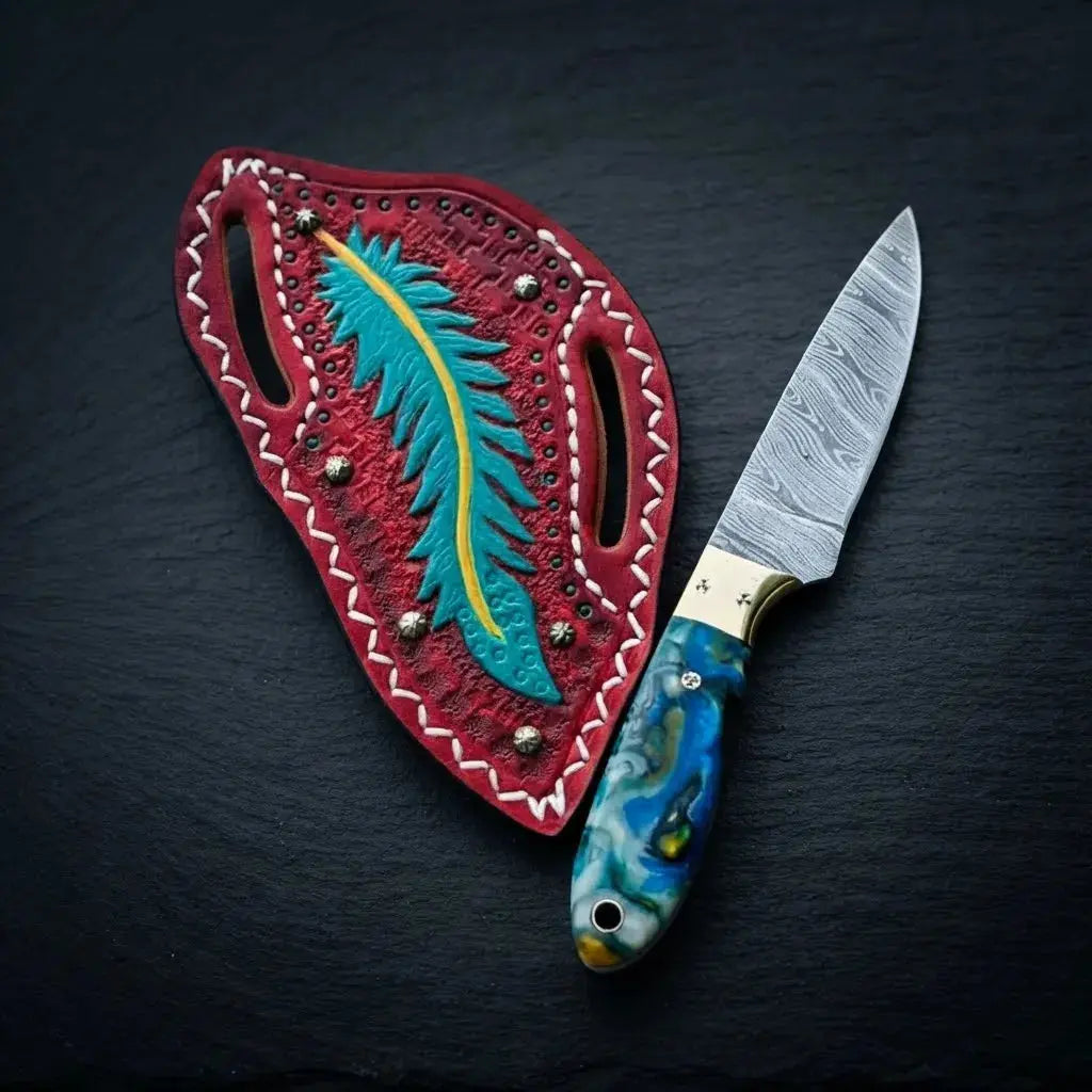 Damascus cowboy skinner knife with resin handle and brass bolster