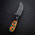 Hand-forged Damascus curved skinning knife with Cholla Cactus handle