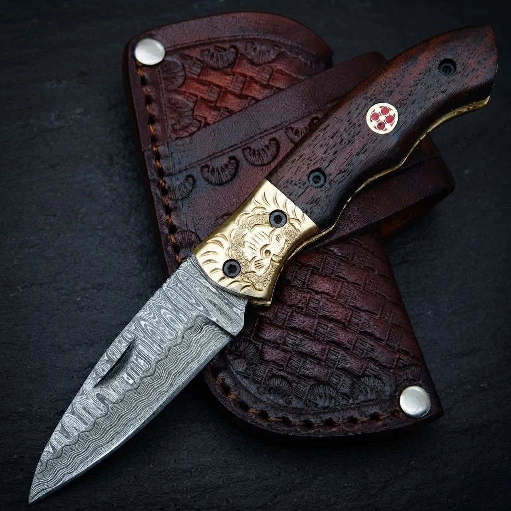 Damascus hand forged drop point folding knife with walnut handle – photo 1