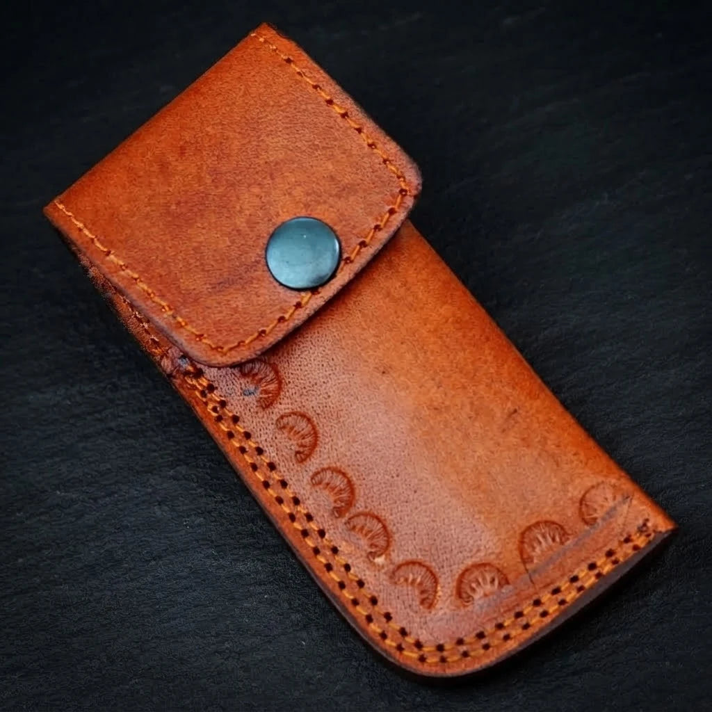 Camel bone handle Damascus folding knife, profile view