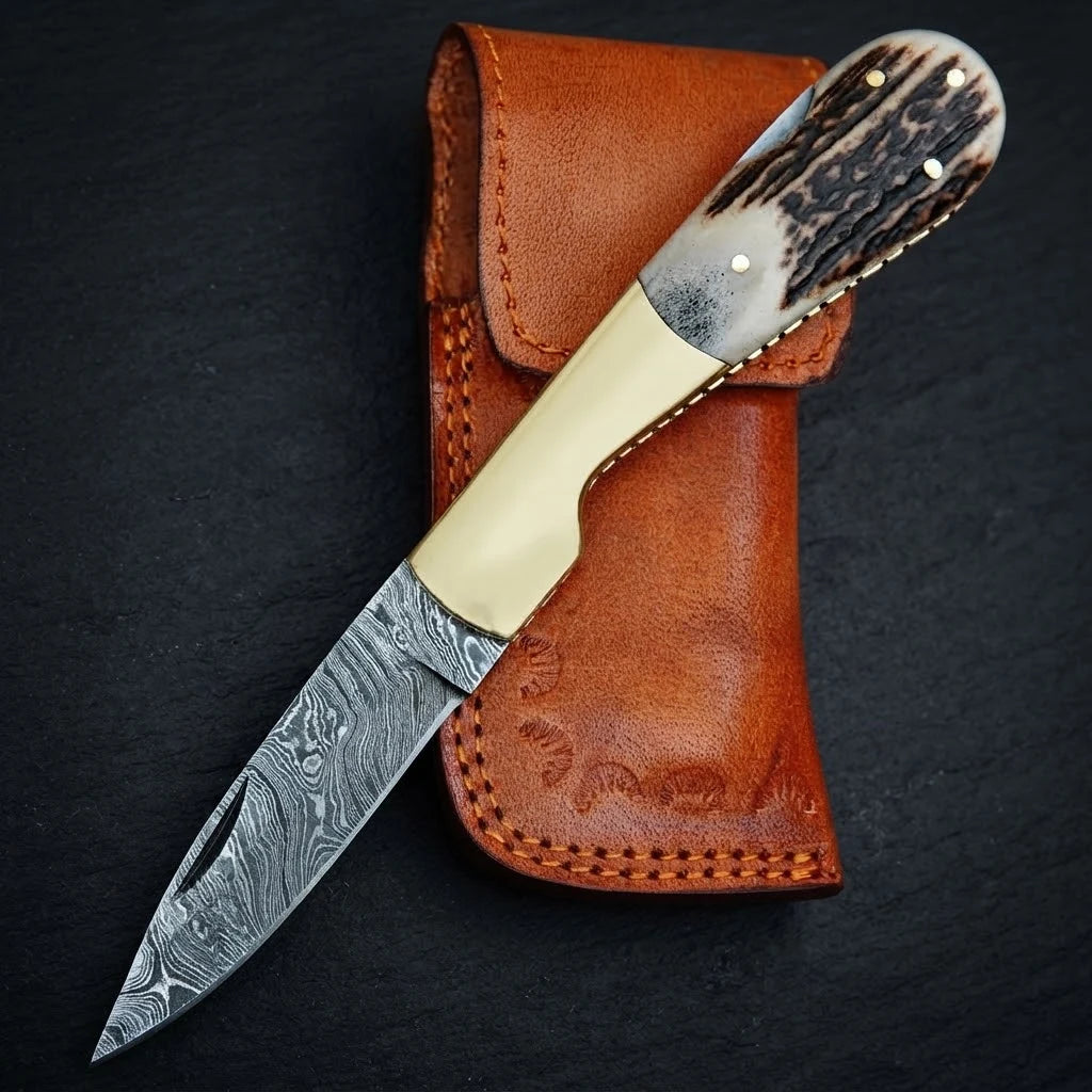 Stag horn handle Damascus folding knife with leather sheath