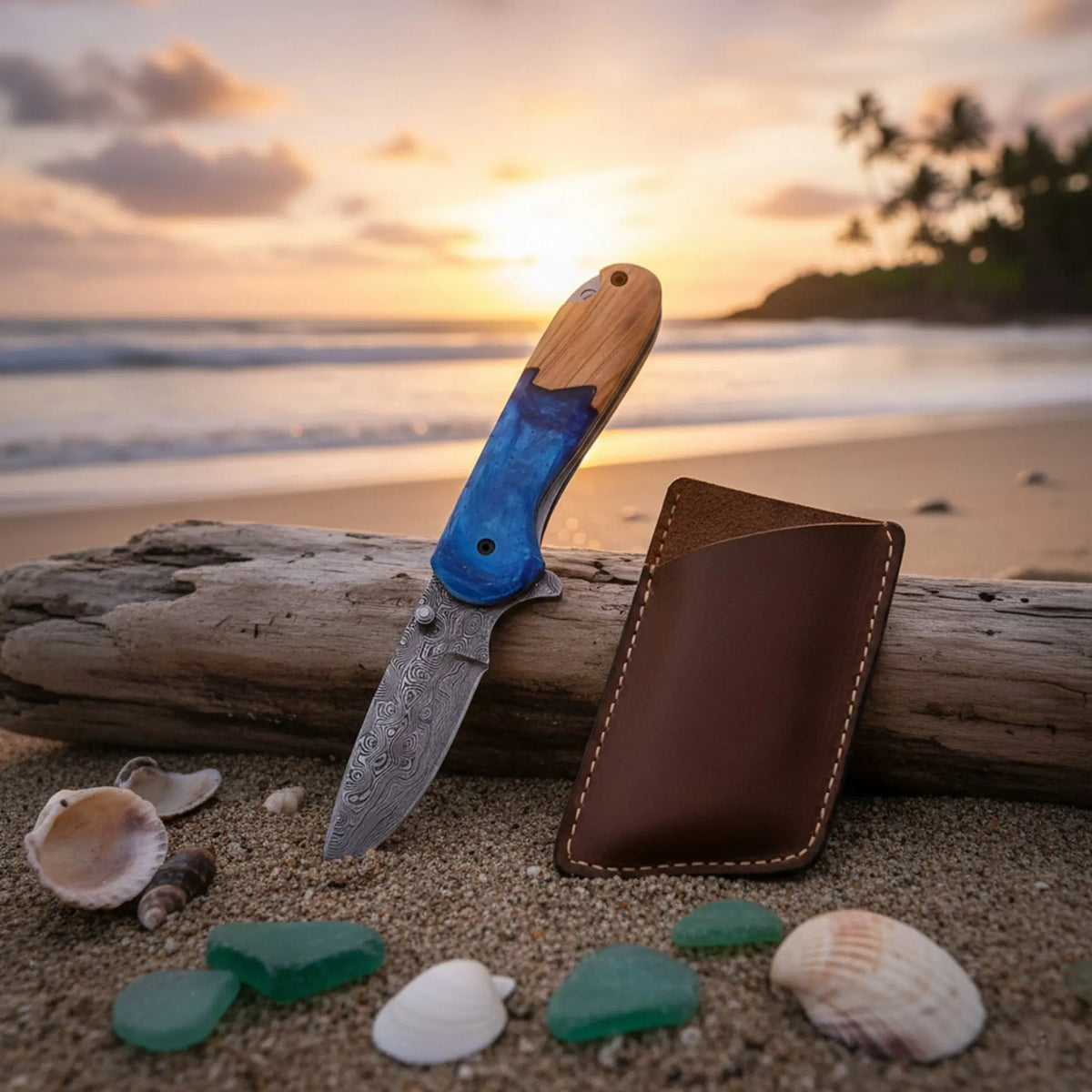 Handmade Damascus steel pocket knife with olive wood and resin handle - blade and Damascus steel pattern close-up
