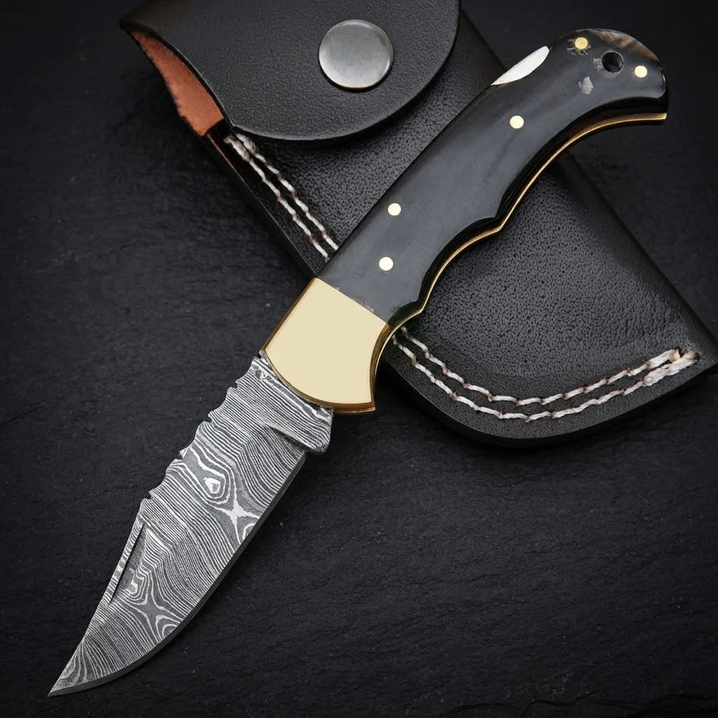 Damascus EDC folding knife with buffalo horn handle and brass bolster – full view