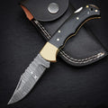 Damascus EDC folding knife with buffalo horn handle and brass bolster – full view