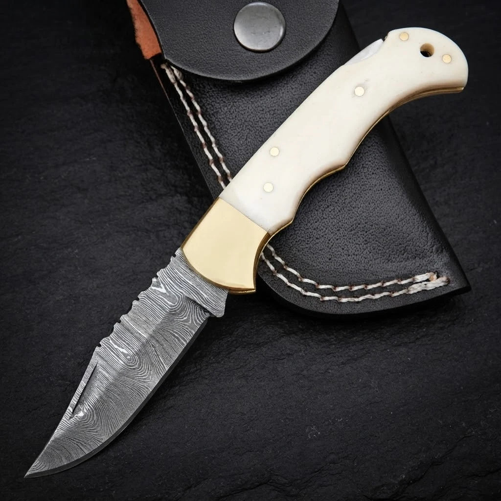 Damascus EDC folding knife with camel bone handle and brass bolster – full view