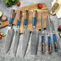 Executive 7-piece Japanese Damascus steel knife set with blue resin and wood handles