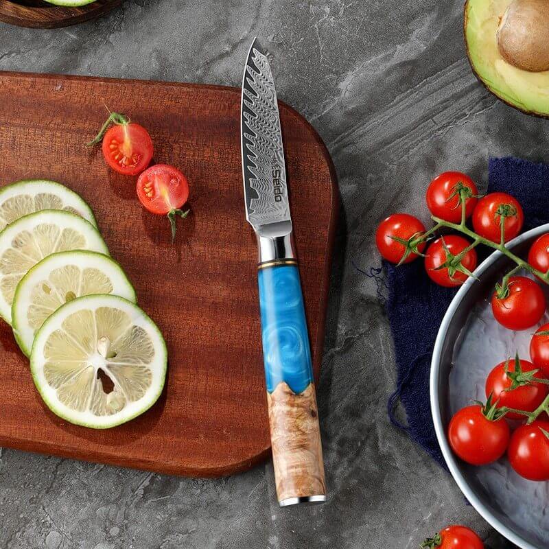 Executive Damascus paring knife with blue resin and wood handle