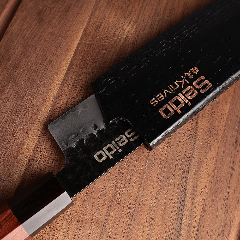 Hageshi AUS-10 knife stored in magnetic carbon sheath cover
