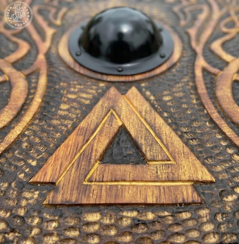 Hand-carved Viking Shield with Norse knotwork design – intricate hand-carved Norse knotwork