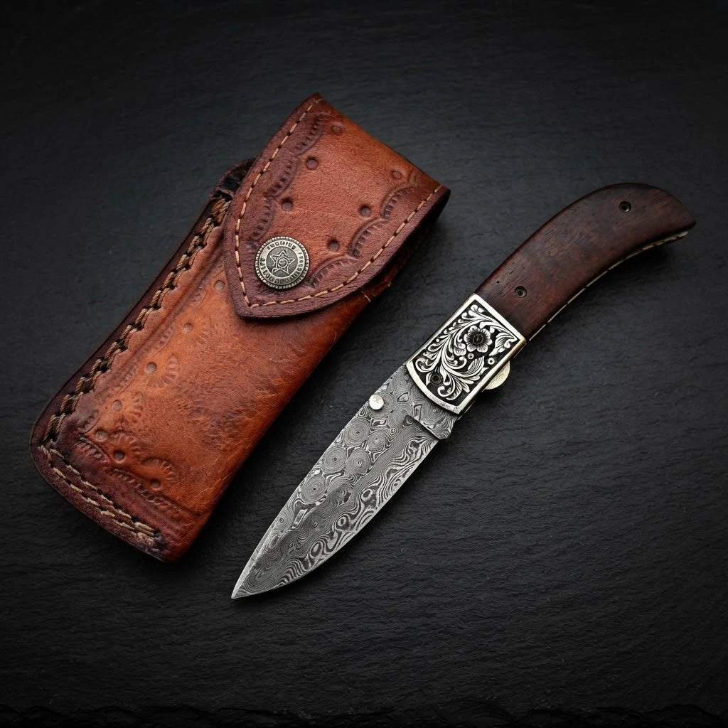 Hand engraved brass bolster folding knife with walnut wood handle