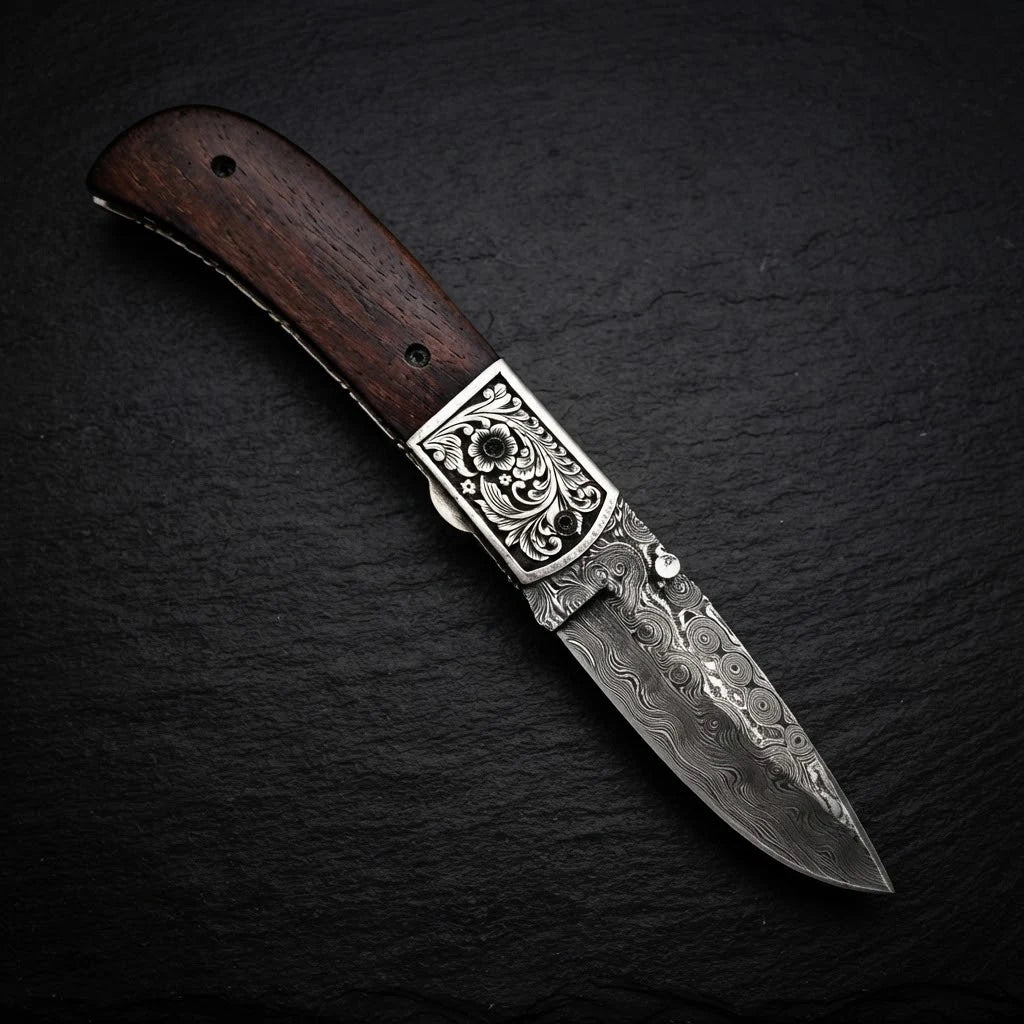 Hand engraved brass bolster detail on walnut wood handle knife