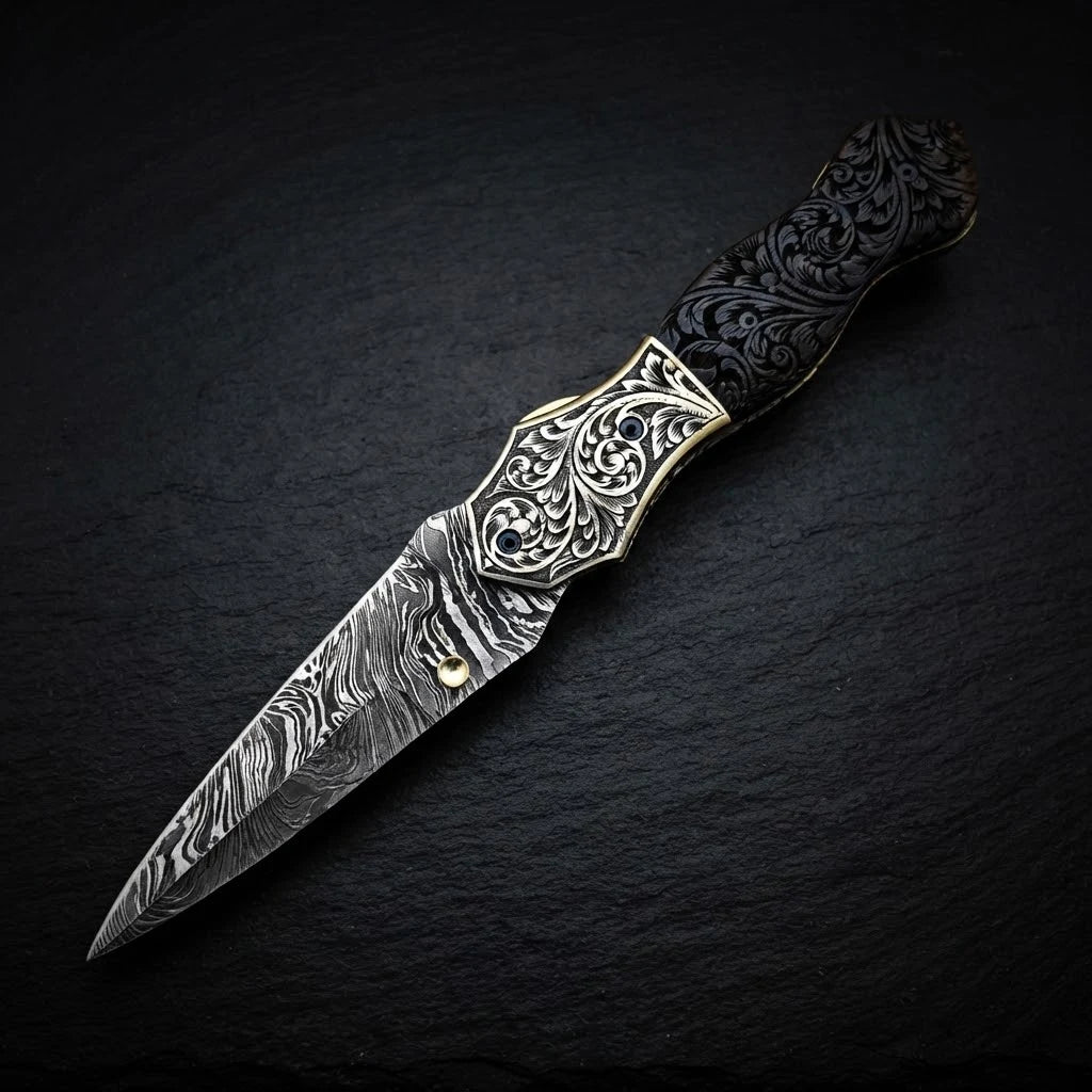 Damascus dagger knife with engraved brass bolster and walnut burl wood handle – handle detail