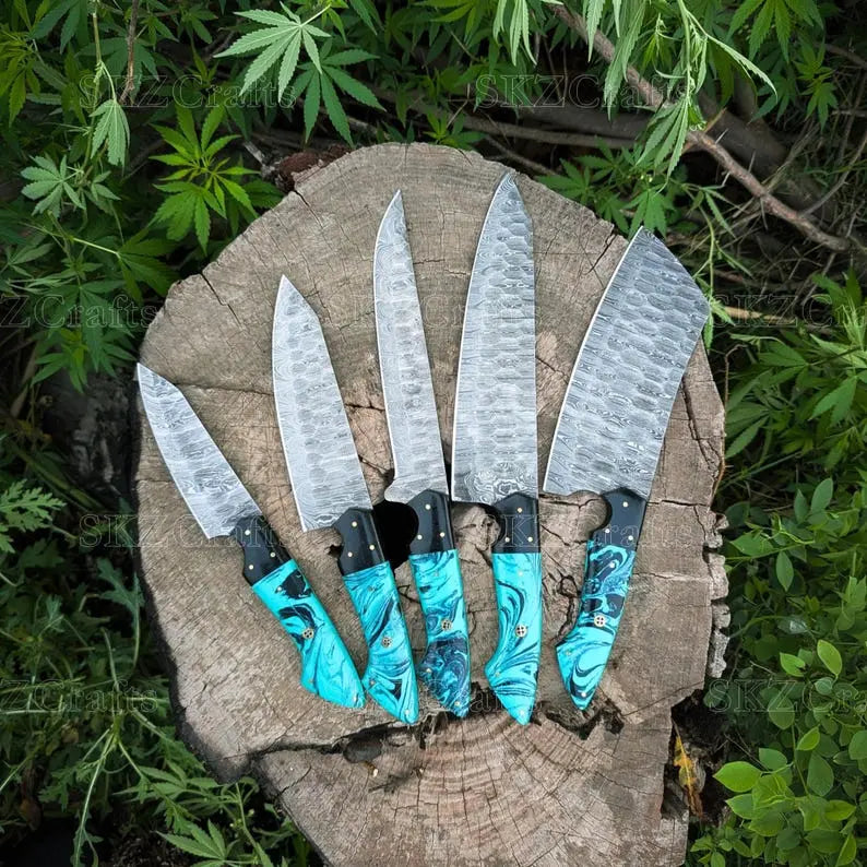 Full set view of handcrafted Damascus steel chef knife set with teal resin handles