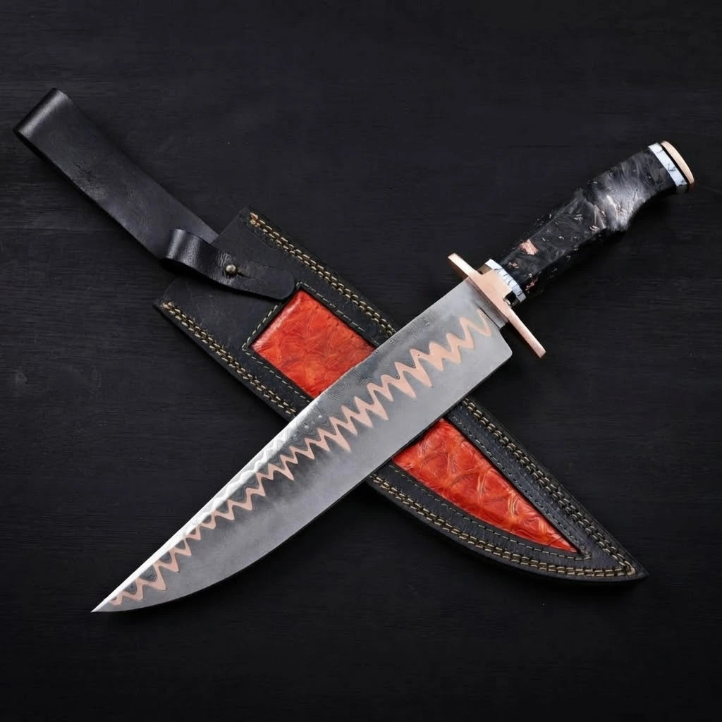 Handforged 11-inch Copper Damascus Bowie knife with a copper guard and dark marbled resin handle, crossing over a black leather sheath with a textured orange insert on a black background