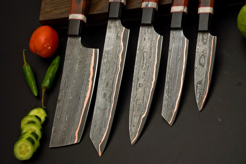 Five handmade copper Damascus knives: chef, cleaver, utility, boning and paring