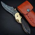 Handmade Damascus folding knife with wenge wood handle and brass bolster
