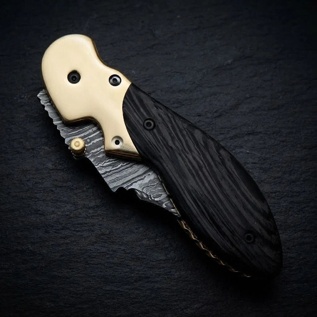 Wenge wood handle folding knife — Damascus steel blade close-up