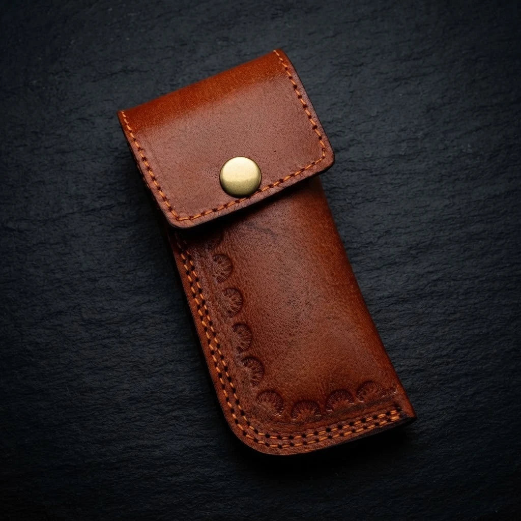 Handmade Damascus folding knife with rosewood handle and Damascus bolster – handle detail