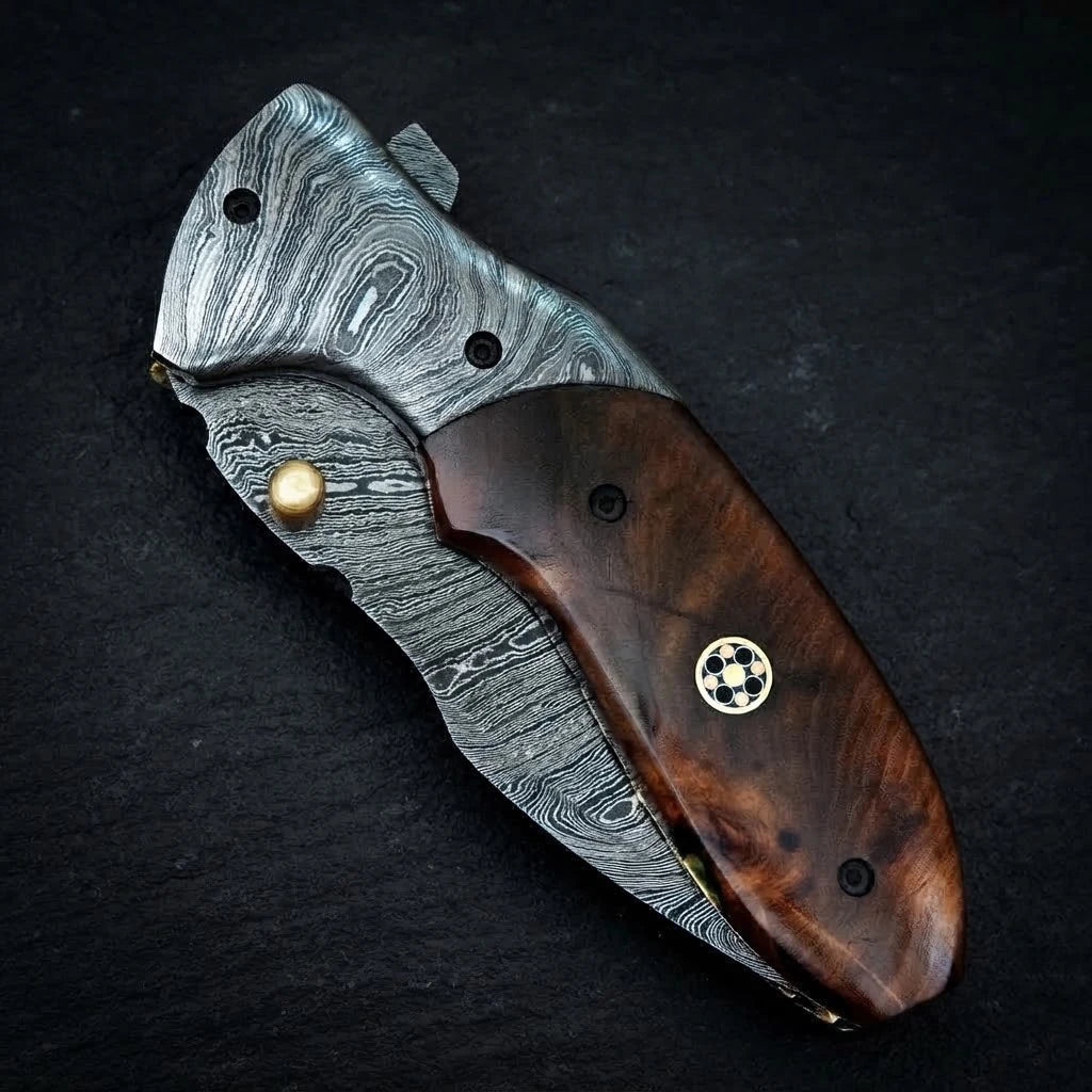 Handmade Damascus folding knife with rosewood handle and Damascus bolster – with leather sheath