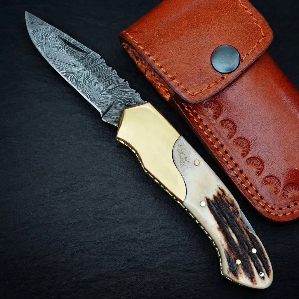Handmade Damascus folding pocket knife with stag horn handle
