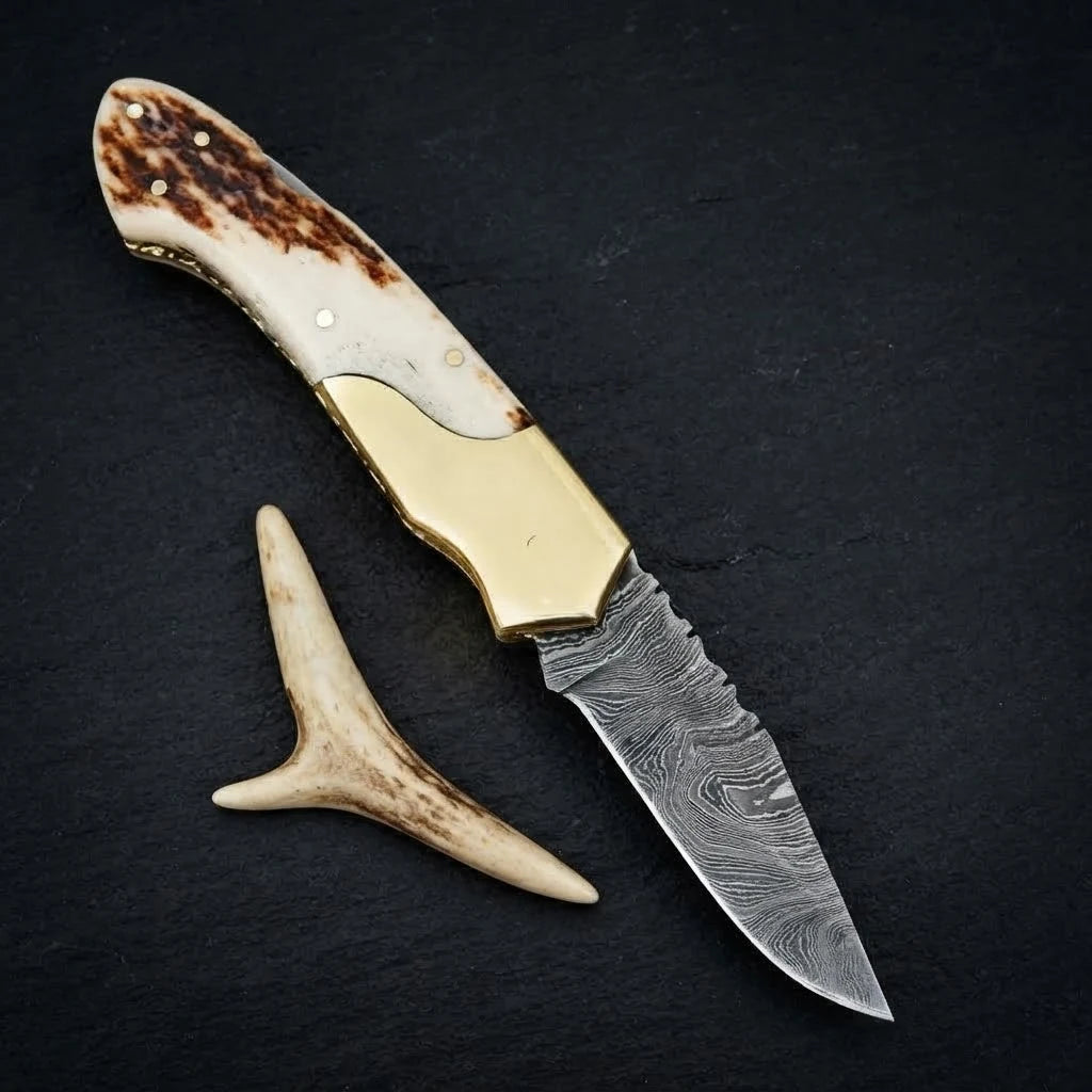 Stag horn handle Damascus folding knife with leather sheath