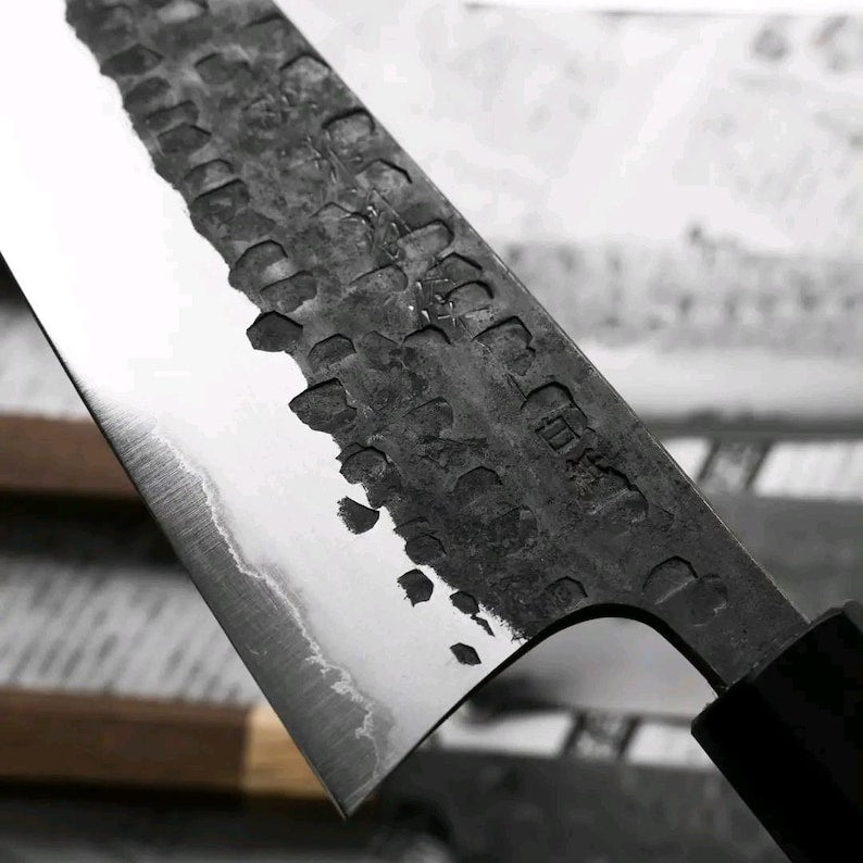 Hammered finish on forged high carbon steel Japanese kitchen knives