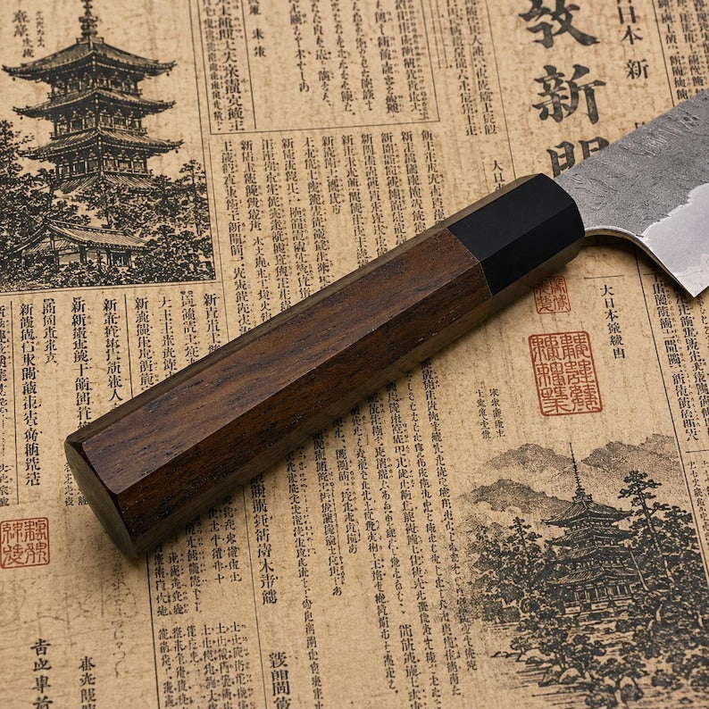 Japanese-inspired handmade chef knife with layered blade pattern
