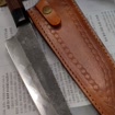 Handmade layered carbon steel Japanese chef knife with wood handle and sheath