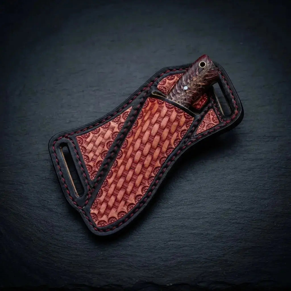 Western skinning knife in horse rasp steel with pinecone resin handle and decorated leather sheath