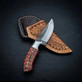 Horse rasp steel cowboy skinner knife with pinecone resin handle and cross-draw leather sheath